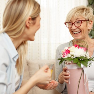 Daughter Gives Mom Flowers