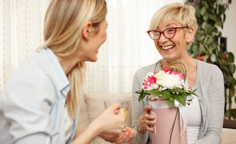 Daughter Gives Mom Flowers