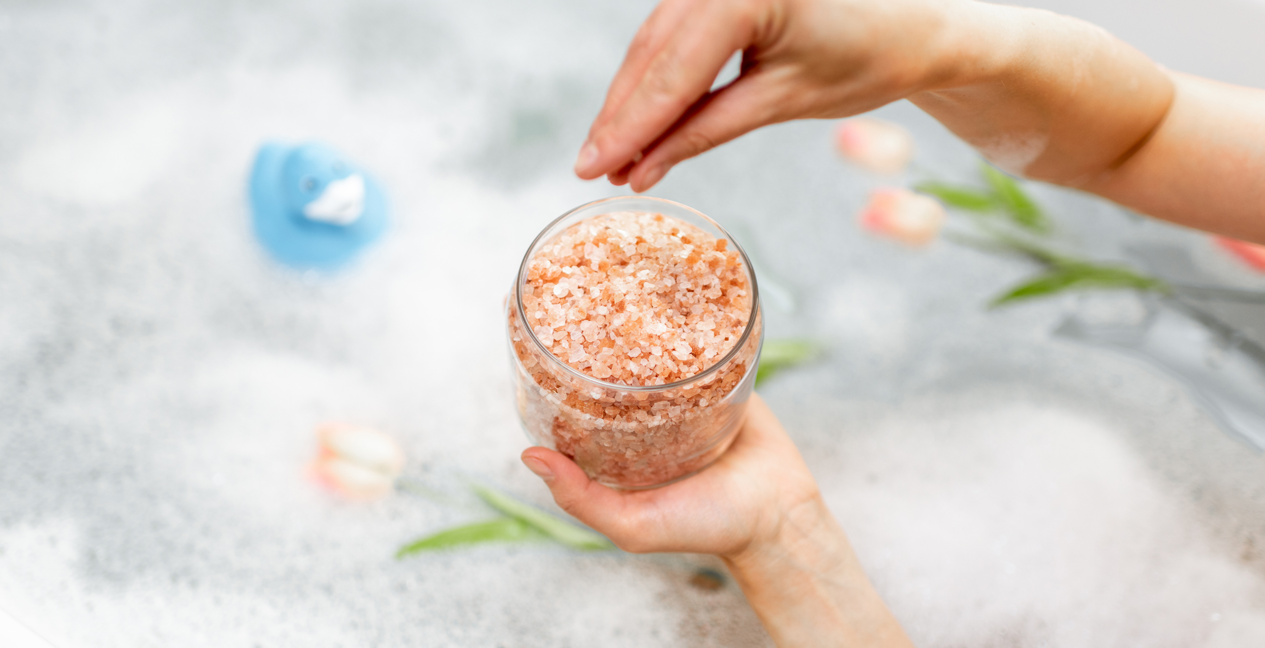 Ditch the bath bombs — here's why you should soak in an Epsom salt