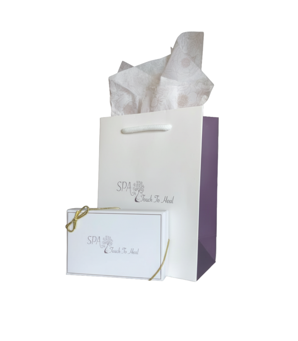 Touch to Heal Spa physical gift card set with premium packaging, perfect for gifting a relaxing facial, therapeutic massage, or aromatherapy session.